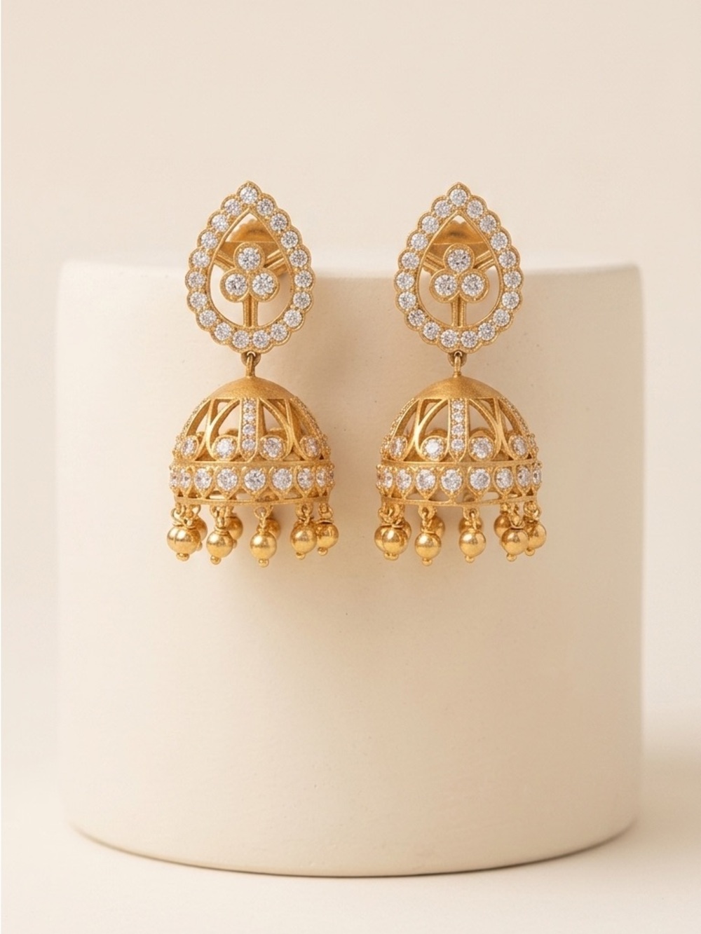 Gold Jhumka Earrings with Sparkling CZ Accents